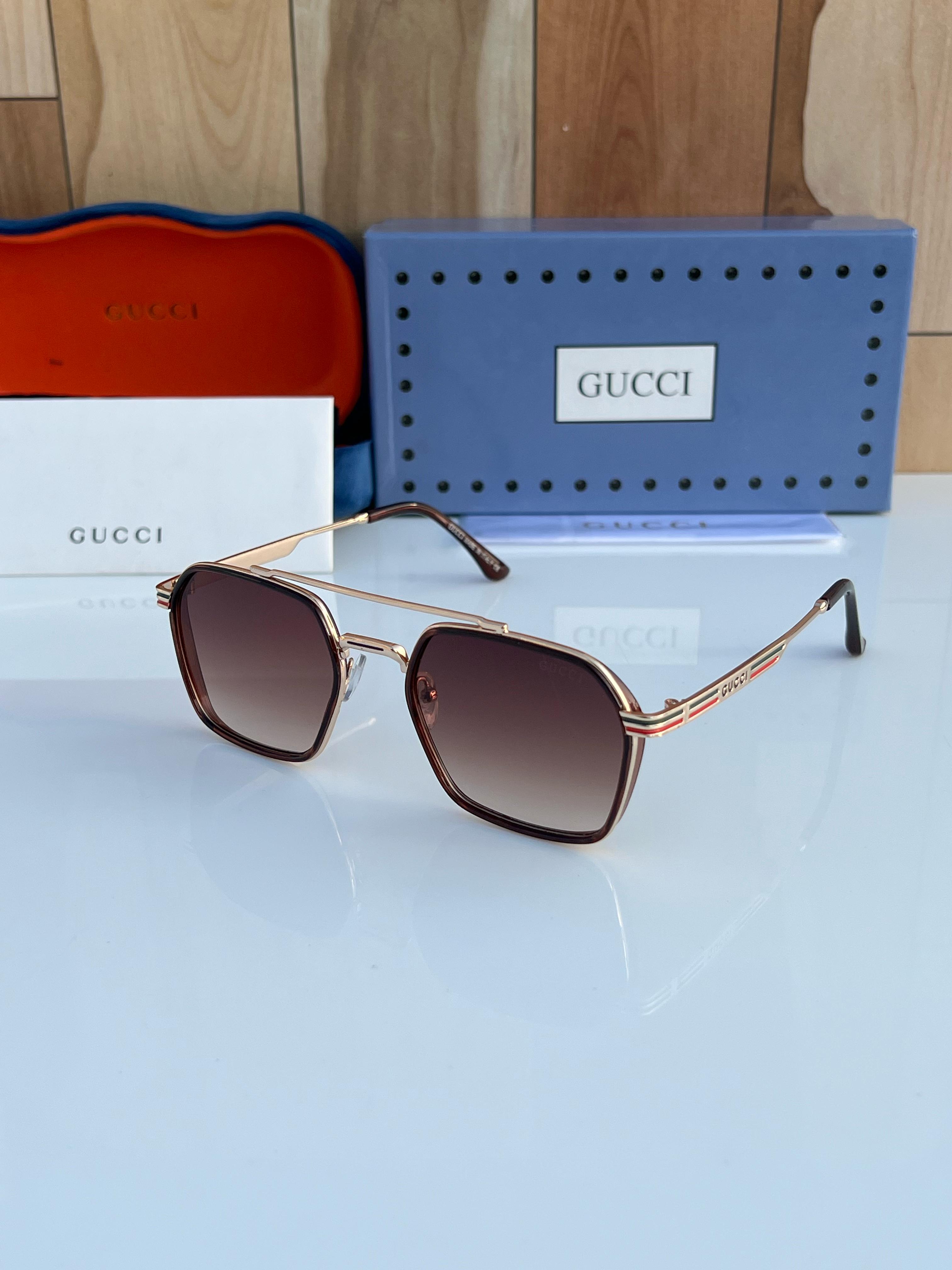 Gu_ci 5064 golden brown sunglass